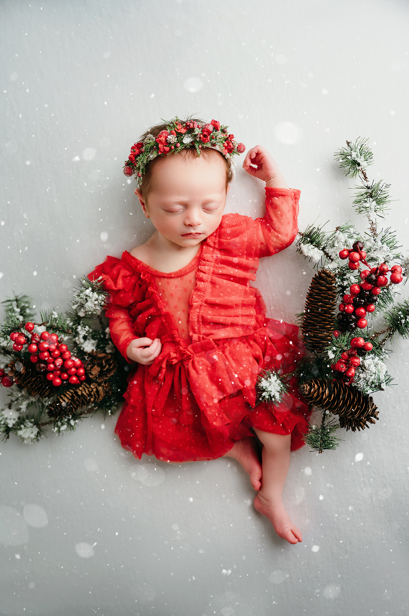 Christmas baby photoshoot with red dress
