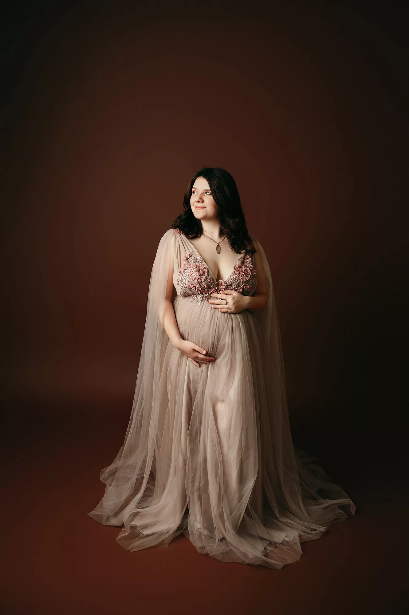 classic maternity photoshoot with tan dress
